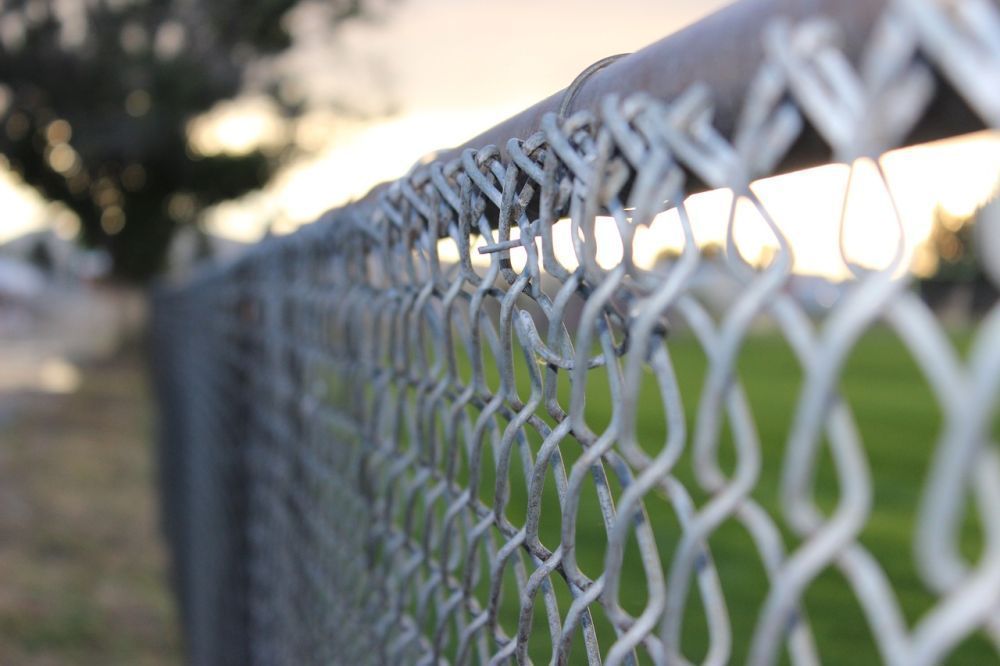How to Make a Chain Link Fence Taller